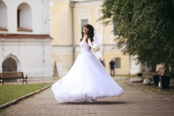 Bride at a wedding in a white dress — Stock Photo, Image