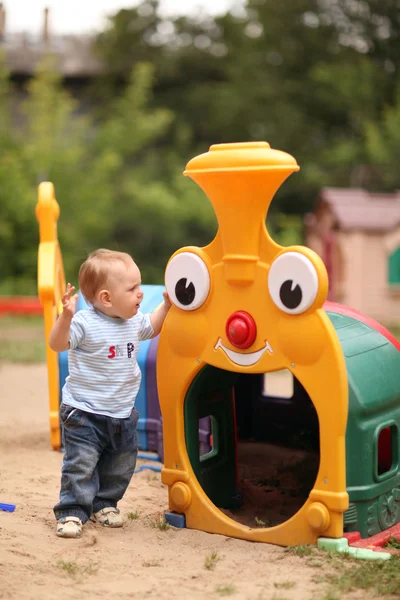 Little boy playing on the playground — Stock Photo, Image