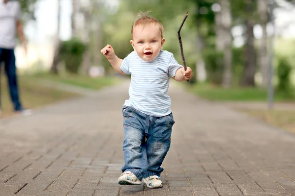 Cheerful little boy in the park — Stock Photo, Image