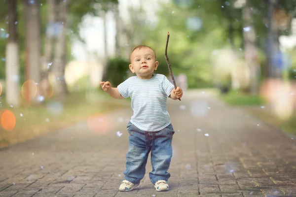 Cheerful little boy in the park — Stock Photo, Image