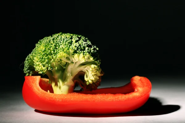 Broccoli with pepper — Stock Photo, Image