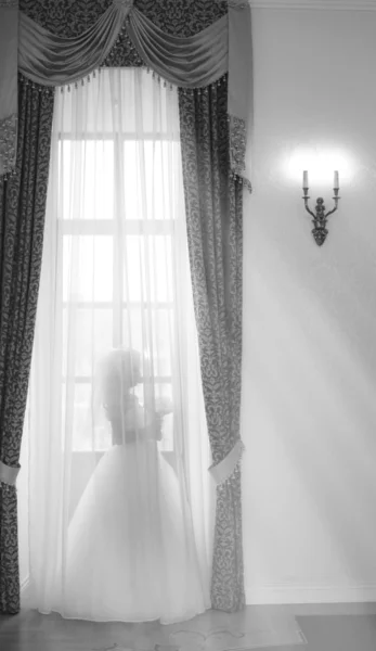 Bride at the window — Stock Photo, Image