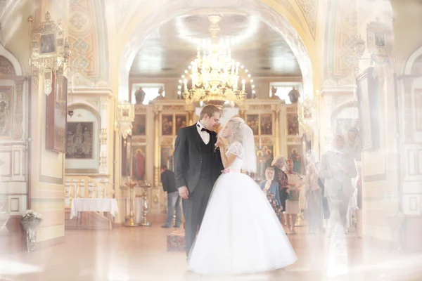 Bride and groom in church — Stock Photo, Image