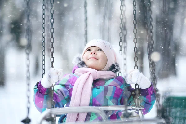 Child girl on swing — Stock Photo, Image