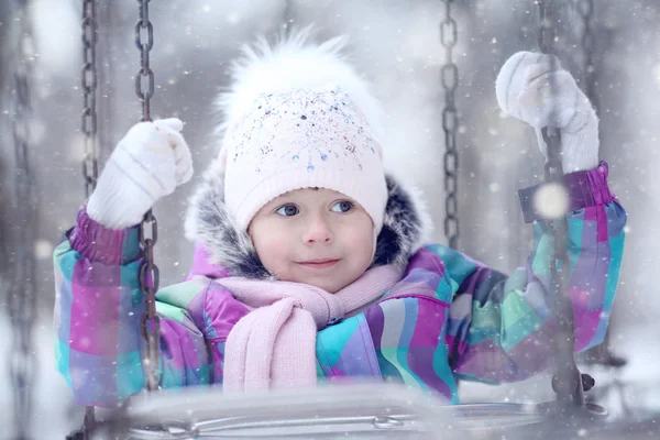 Child girl on swing — Stock Photo, Image