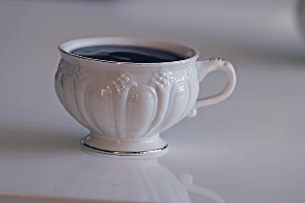 Beyaz fincan çay ile tanımlama — Stok fotoğraf