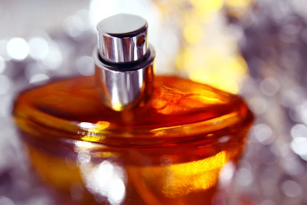 Orange perfume bottle — Stock Photo, Image