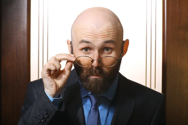 Curious bearded businessman — Stock Photo, Image