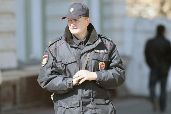 Policeman on May Day demonstration