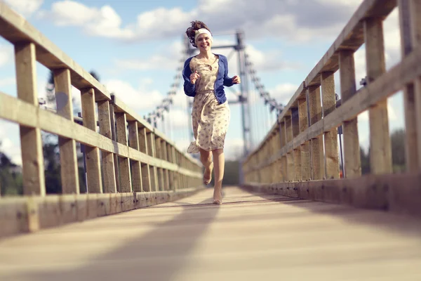 Girl on bridge — Stock Photo, Image