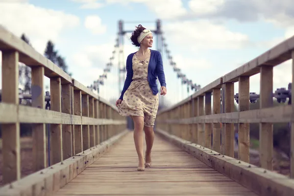 Girl on bridge — Stock Photo, Image