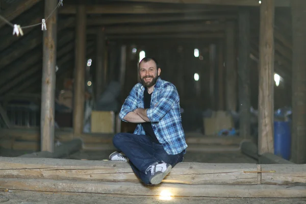 Bearded  man in attic — Stock Photo, Image