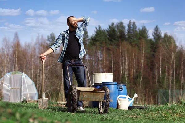 Man with wheelbarrow — Stock Photo, Image