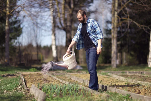 Man  with watering can