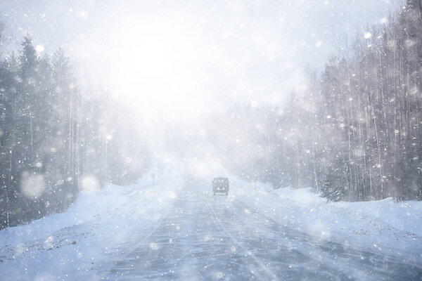 winter highway snowfall background fog poor visibility