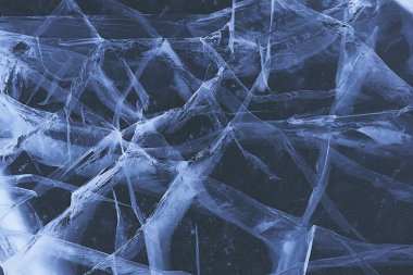 Buz dokusu Baykal 'ı çatlatıyor, soyut arkaplan kış buzu şeffaf mavi