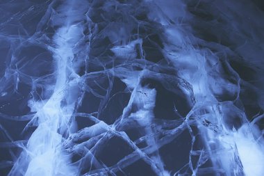 Buz dokusu Baykal 'ı çatlatıyor, soyut arkaplan kış buzu şeffaf mavi