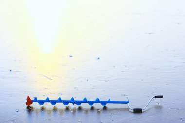 Buz kesme matkabı arka plan buzu, kış sporu aleti balıkçılık