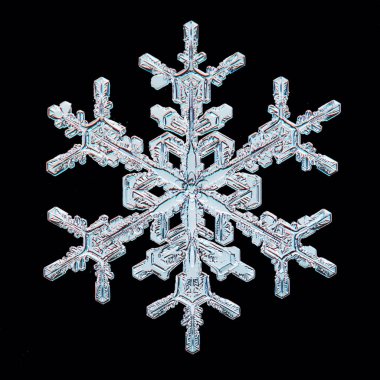 Siyah arkaplan kar tanesi izole, soyut nesne kış detayı