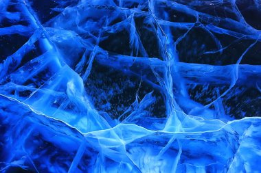 Buz dokusu Baykal 'ı çatlatıyor, soyut arkaplan kış buzu şeffaf mavi