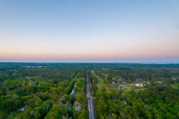 Gün batımında Alabama, Mobile yakınlarında demiryolu 