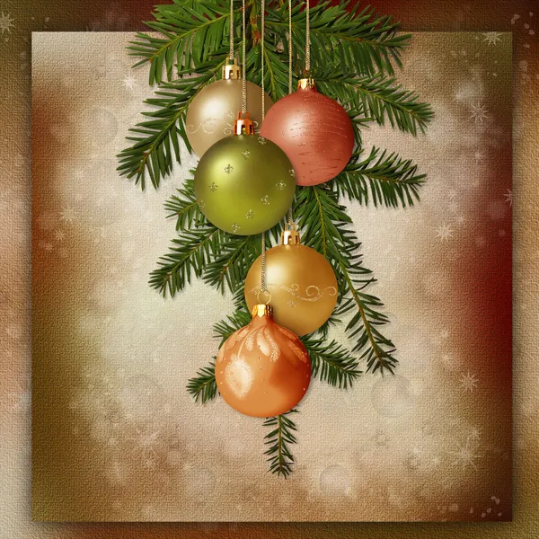 Julgranskulor och spruce grenar på en vintage bakgrund — Stockfoto