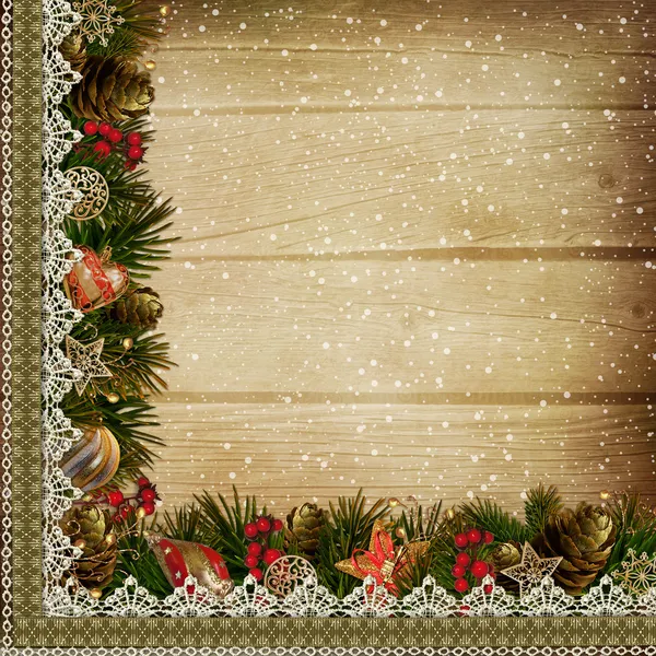 Karácsonyi díszek és csipke, a fából készült háttér — Stock Fotó