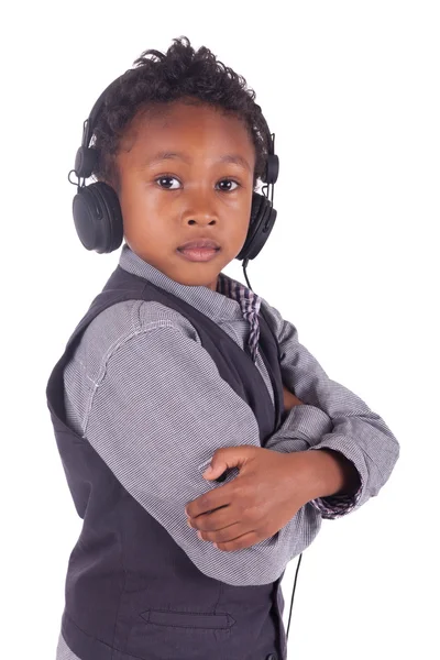 Indian little boy listening to music — Stock Photo, Image