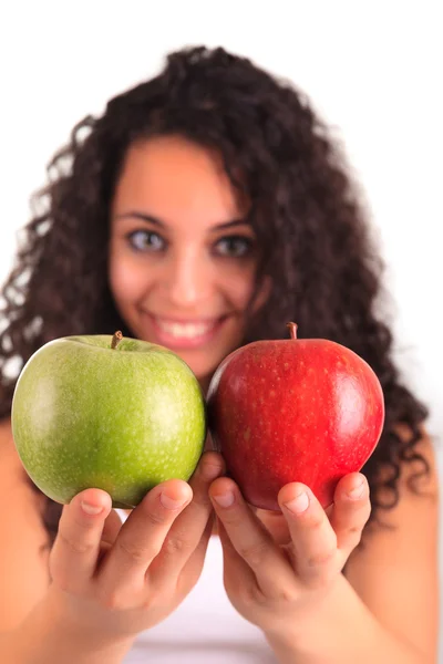 Young woman holding apple. Isolated over white — Stock Photo, Image