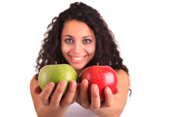 Young woman holding apple. Isolated over white — Stock Photo, Image