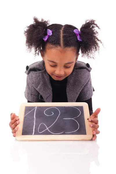 Estudiante niña con hermoso peinado aislado sobre blanco — Foto de Stock