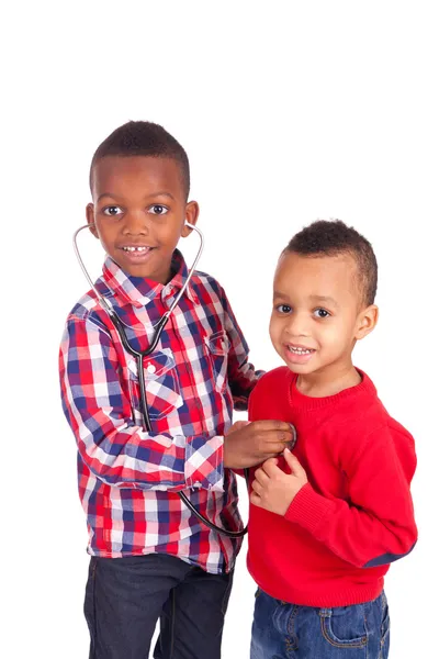 Niño afroamericano negro con estetoscopio — Foto de Stock