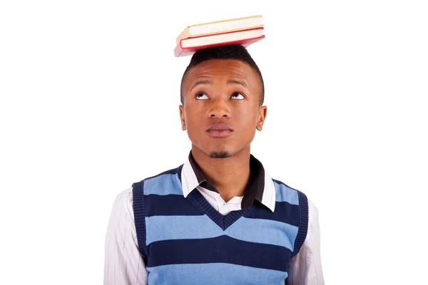 Ung amerikansk student med en bok — Stockfoto
