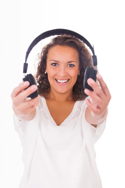 Woman listening to music with headphones — Stock Photo, Image