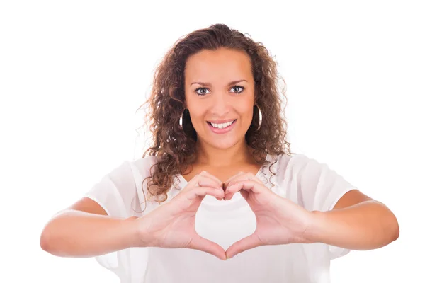 Hermosa joven mujer haciendo un corazón con las manos —  Fotos de Stock