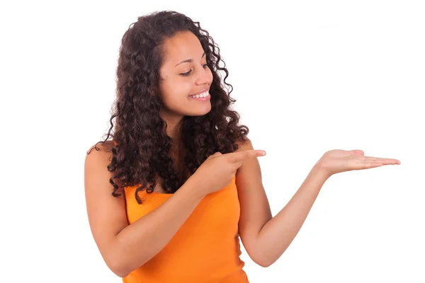 Young african american woman displaying something — Stock Photo, Image