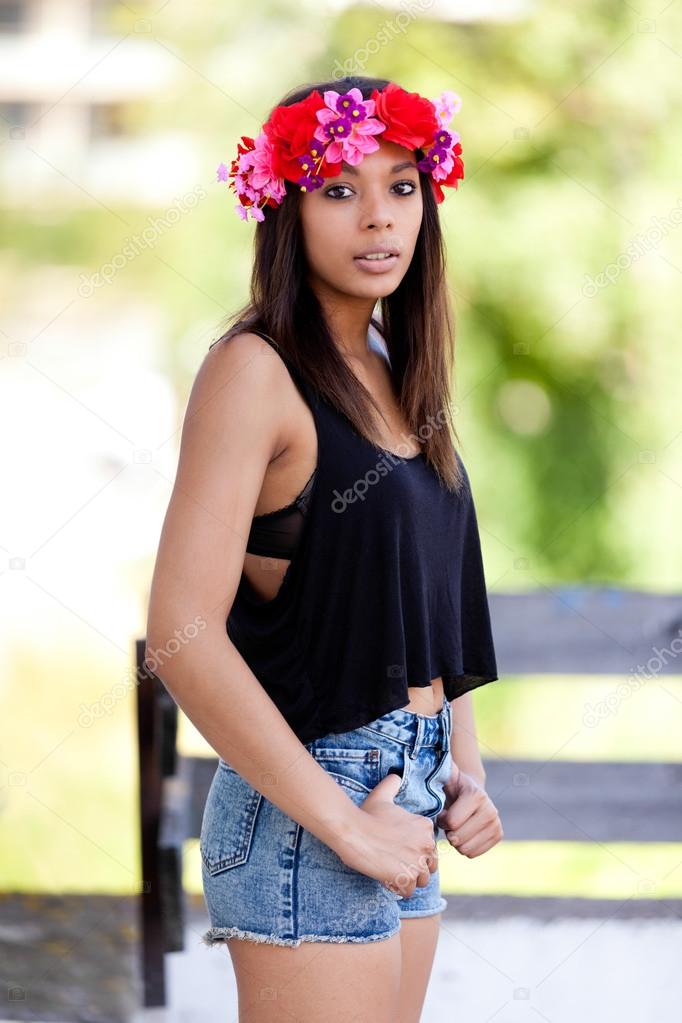 Portrait of a beautiful african young woman outdoors