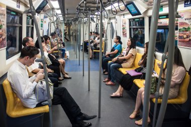People ride in BTS Skytrain clipart