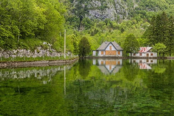 Houses Reflecting Pluzensko Jezero Lake Bovec Village Slovenia — Zdjęcie stockowe