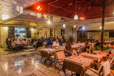 SPLIT, CROATIA - MAY 26, 2019: Evening view of an open air restaurant in Split, Croatia