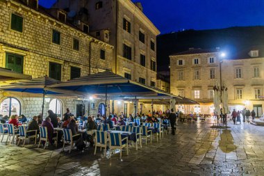 DUBROVNIK, CROATIA - MAY 31, 2019: Evening view of an open air restaurant in the old town of Dubrovnik, Croatia
