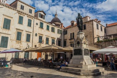 DUBROVNIK, CROATIA - MAY 31, 2019: Ivan Gundulic monument  in the old town of Dubrovnik, Croatia