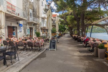 KORCULA, CROATIA - MAY 30, 2019: Seaside promenade in Korcula town, Croatia