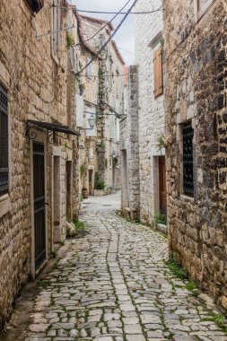 Narrow alley in the old town of Trogir, Croatia