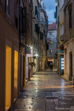 SPLIT, CROATIA - MAY 27, 2019: Evening view of a narrow alley in Split, Croatia
