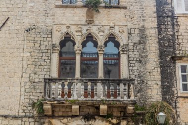 Windows of Cippiko Palace in the old town of Trogir, Croatia