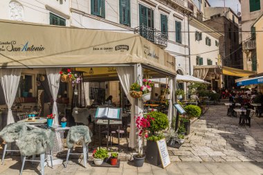 SIBENIK, CROATIA - MAY 25, 2019: Open air restaurants in Sibenik, Croatia