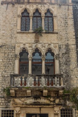 Windows of Cippiko Palace in the old town of Trogir, Croatia