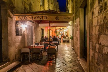 DUBROVNIK, CROATIA - MAY 31, 2019: Evening view of   a narrow alley in the old town of Dubrovnik, Croatia