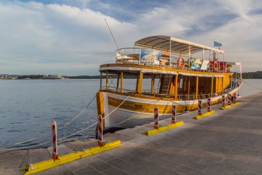 SIBENIK, CROATIA - MAY 25, 2019: Wooden tour boat in Sibenik port, Croatia